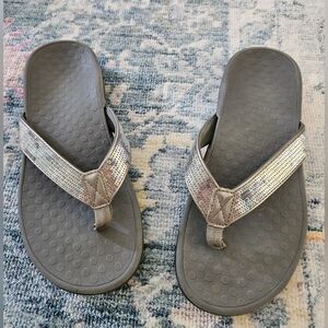 Vionic Silver sequined flip flop sz 7.5, gently used, no sign of wear.